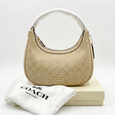 Coach Signature Canvas Mini Penn Shoulder Bag – Elegant Crescent Hobo Handbag