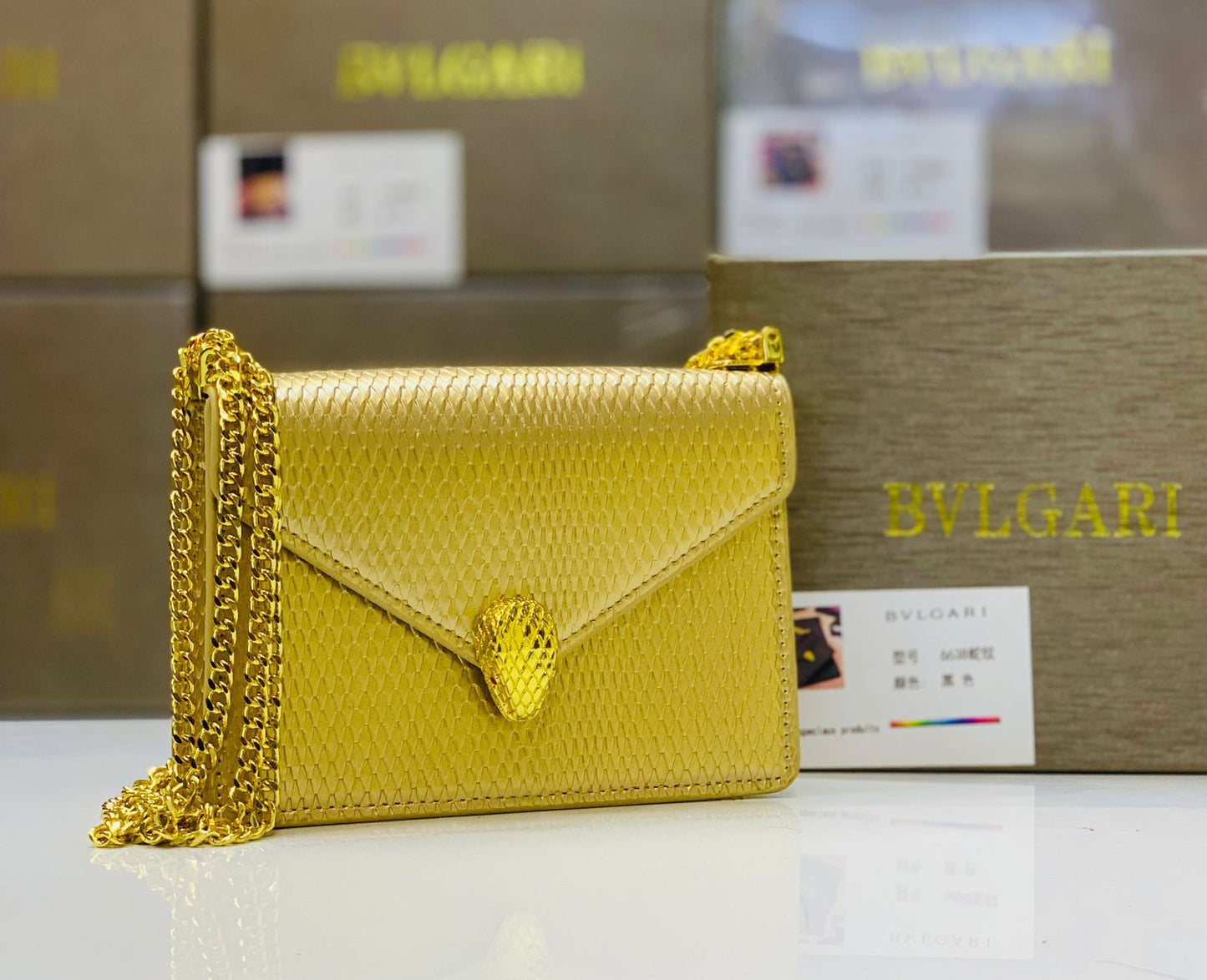Bvlgari Serpenti Forever Silver & Golden Metallic Leather Clutch with Gold-Tone Chain