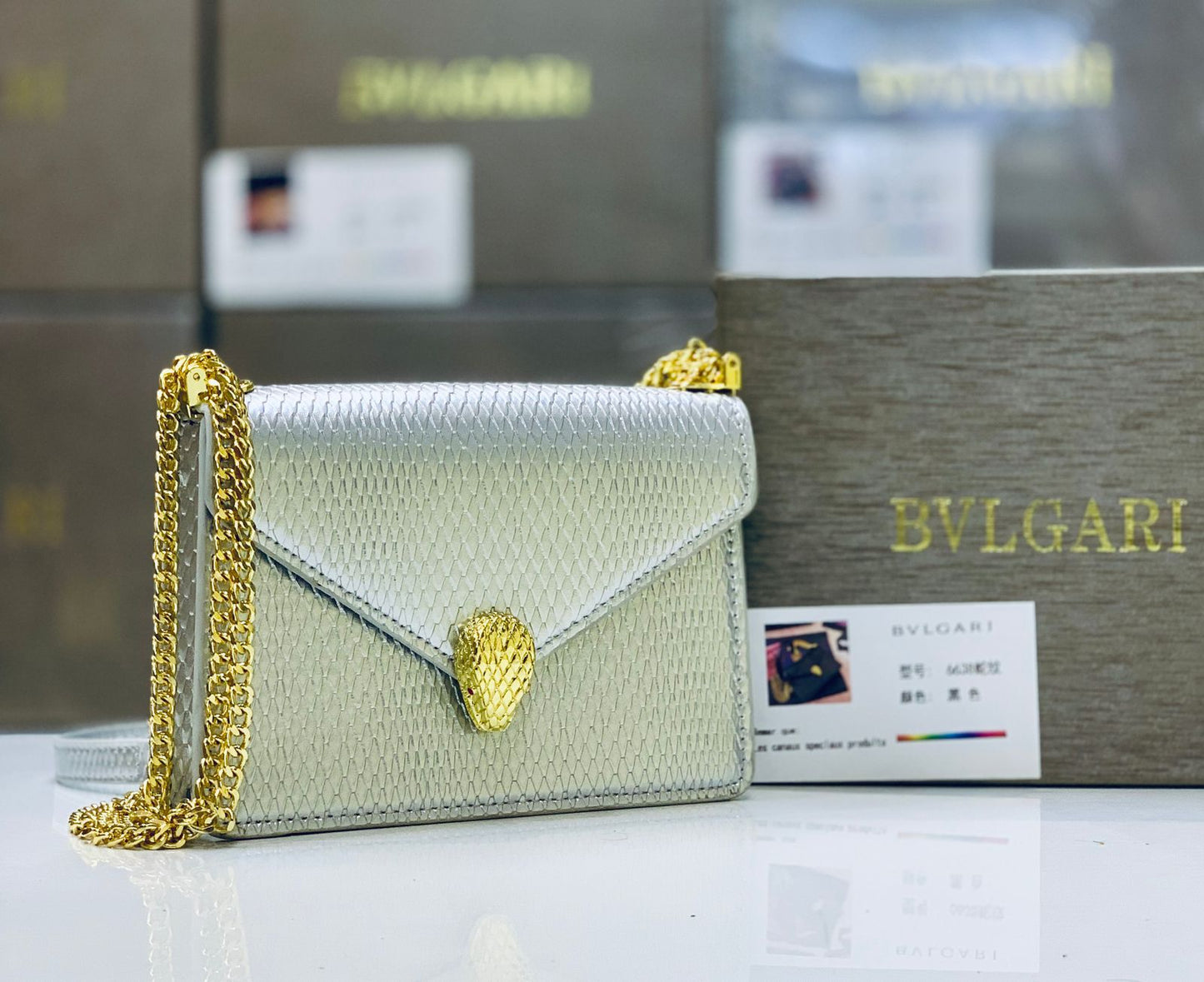 Bvlgari Serpenti Forever Silver & Golden Metallic Leather Clutch with Gold-Tone Chain