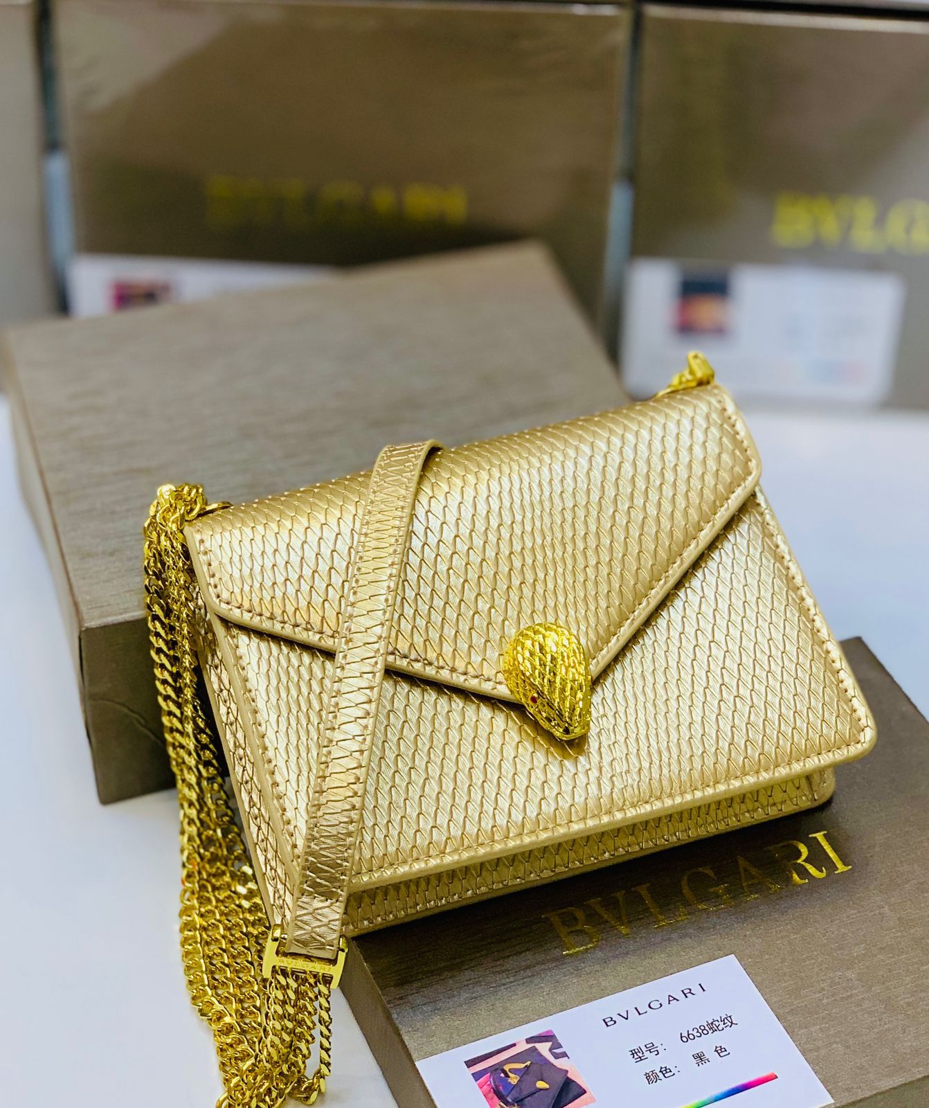 Bvlgari Serpenti Forever Silver & Golden Metallic Leather Clutch with Gold-Tone Chain