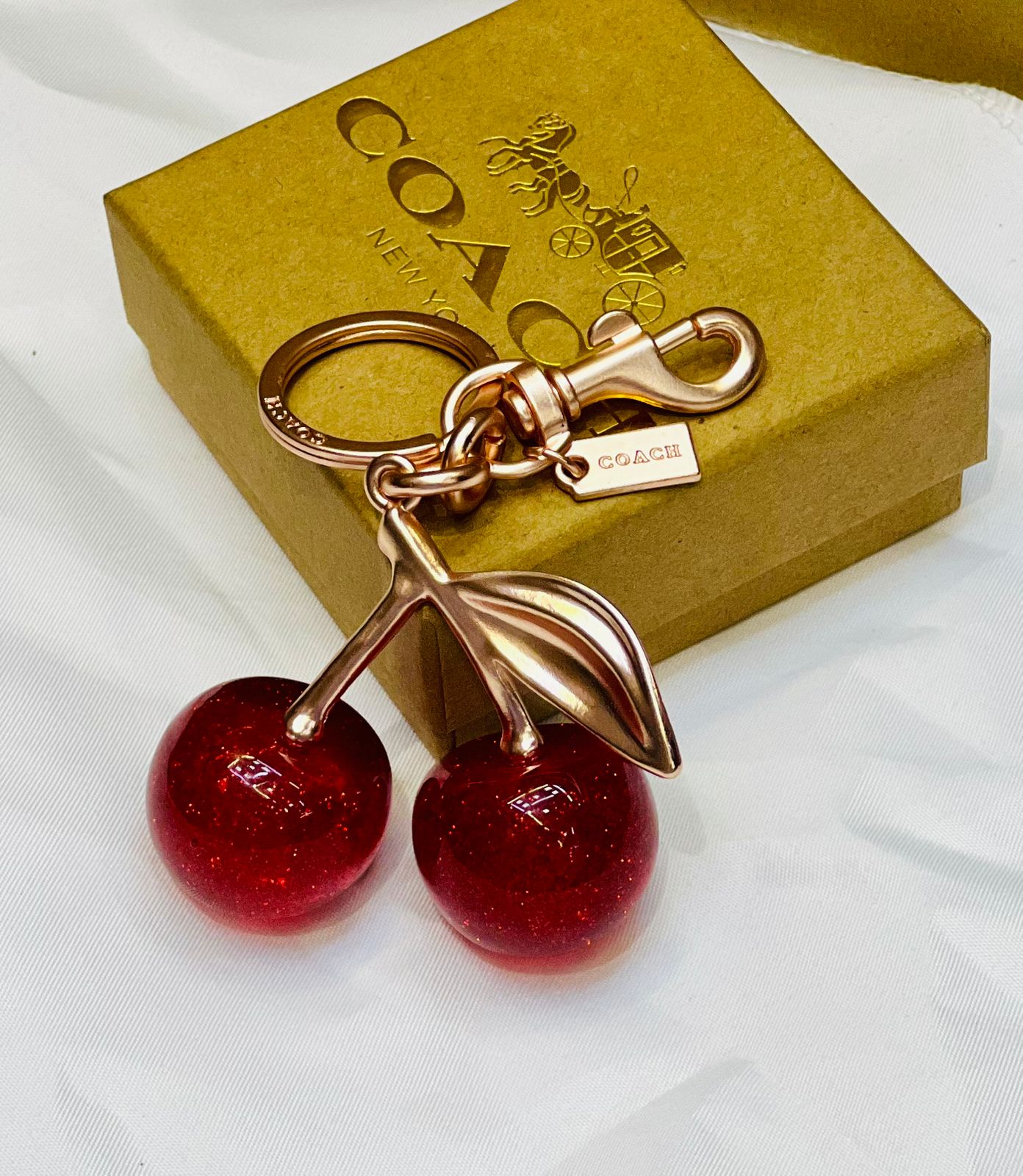 COACH Cherry Bag Charm in Rose Gold-Tone with Glazed Resin – Luxury Purse Accessory