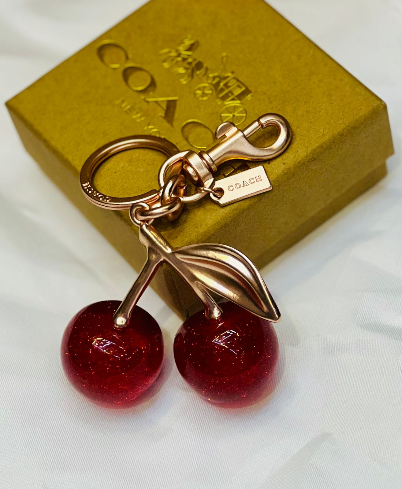 COACH Cherry Bag Charm in Rose Gold-Tone with Glazed Resin – Luxury Purse Accessory